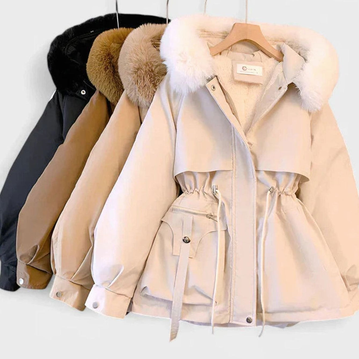 Homixa women's padded winter jacket with faux-fur hood, drawstring waist, and sherpa lining, perfect for cold weather.