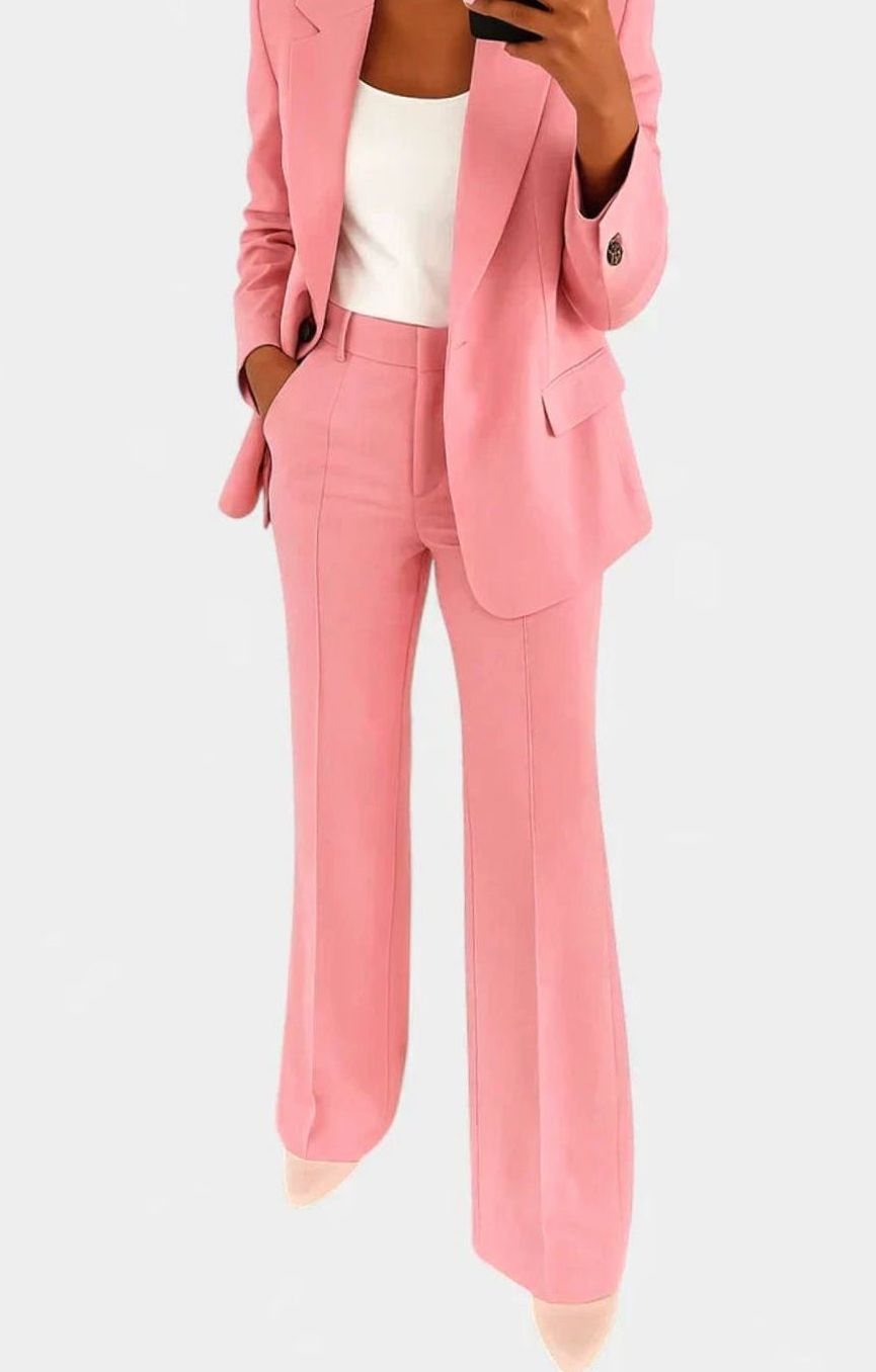 Women's two-piece pant suit by Homixa featuring a tailored fitted blazer, flared pants, and high-waist cut.