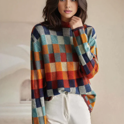 Women’s plaid color-block knit sweater by Homixa with mock neck and ribbed cuffs, featuring a stylish and cozy design.