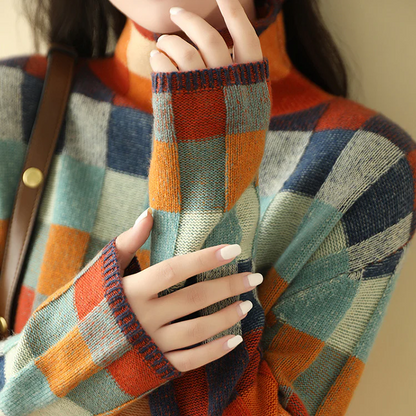 Women's plaid color-block knit sweater by Homixa featuring a mock neck and ribbed cuffs, displayed on a white background.