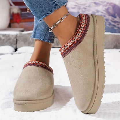 Women's plush-lined slip-on winter slippers by Homixa with boho trim and rubber sole, cozy and stylish indoor footwear.