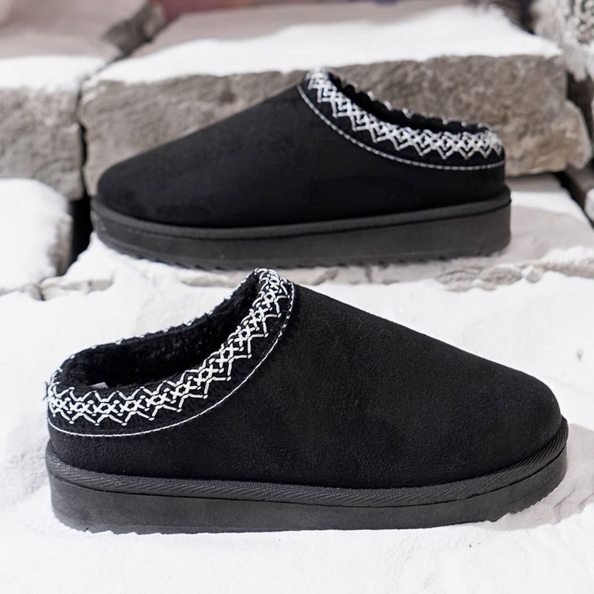 Women's plush-lined slip-on winter slippers by Homixa with boho trim and rubber sole, cozy and stylish indoor footwear.