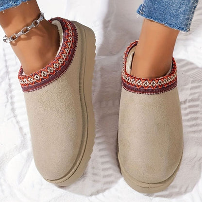 Women's plush-lined slip-on winter slippers with boho trim and rubber sole by Homixa, showing cozy interior and stylish design
