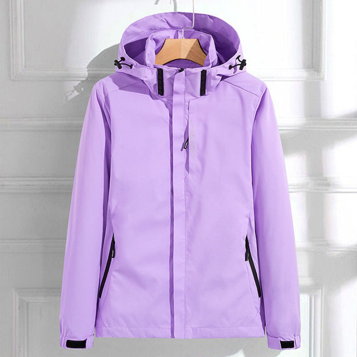 Women's polyester rain jacket with removable hood, double zipper, and adjustable fit by Homixa, shown with front view and features.