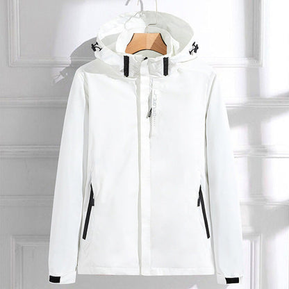 Women’s polyester rain jacket by Homixa featuring a removable hood, double zip closure, and adjustable fit.