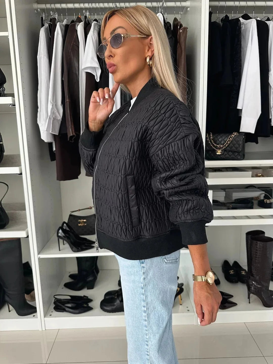 Women's Homixa quilted bomber jacket with zip-front closure, structured silhouette, and stylish design.