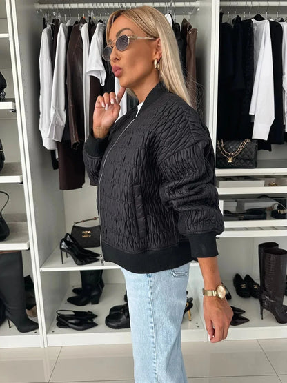 Women's Homixa quilted bomber jacket with zip-front closure, structured silhouette, and stylish design.