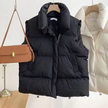 Women's quilted boxy-fit puffer vest with shawl collar and two-way zipper, stylish Homixa puffer vest for cold weather.