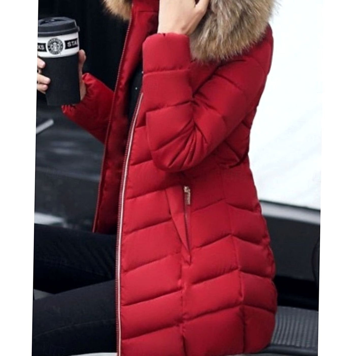 Women's quilted parka by Homixa with vegan-fur hood trim, chevron pattern, and gold zippers, shown front view with stylish details.