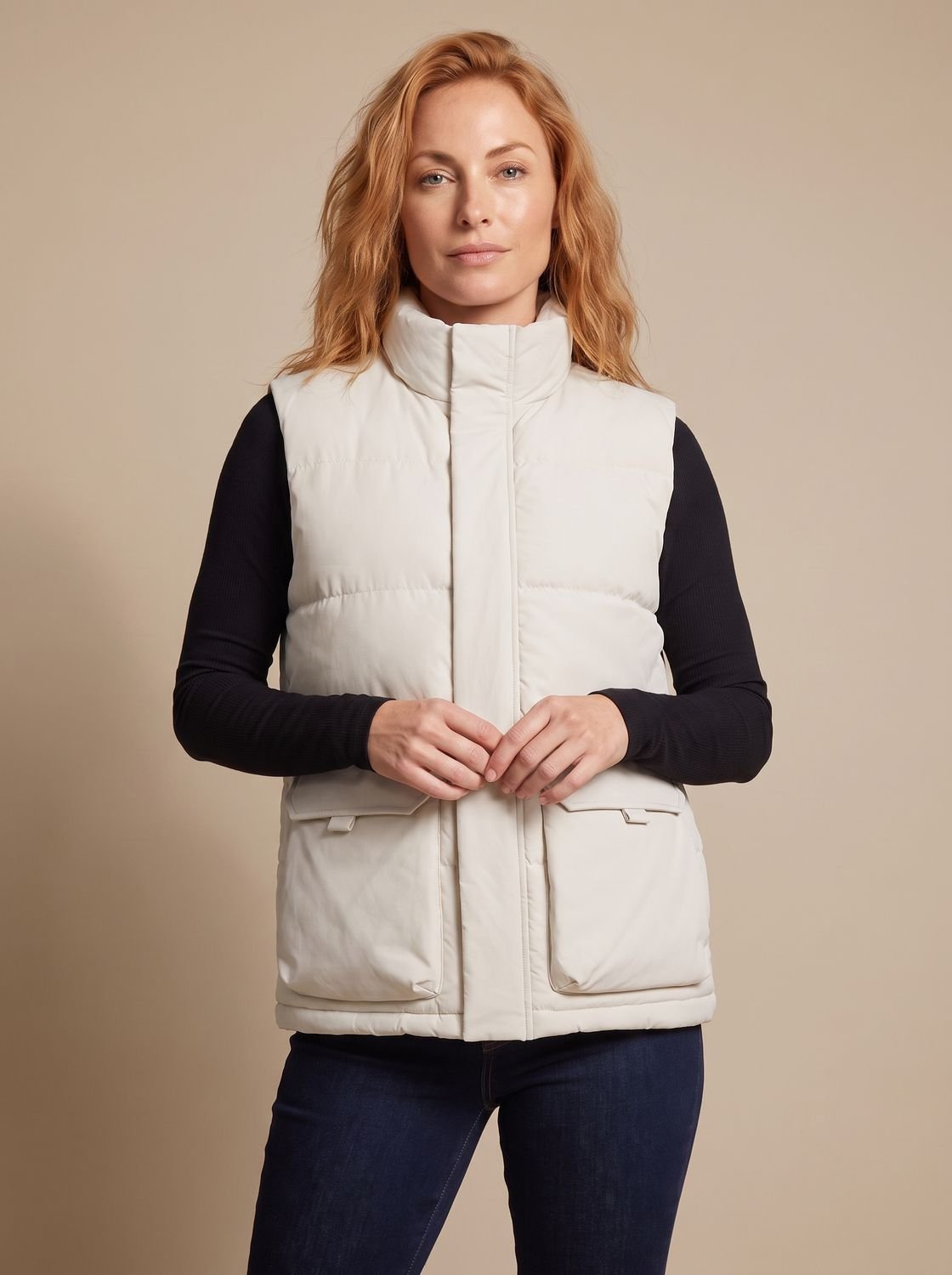 Women's quilted puffer vest with stand collar, flap pockets, and hidden zipper by Homixa, insulated for warmth and style.