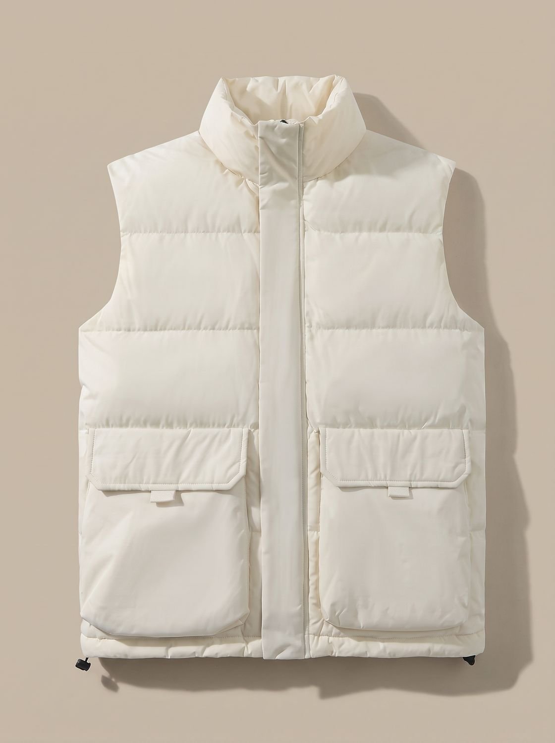 Women's quilted puffer vest with stand collar, flap pockets, and hidden zipper by Homixa, showcasing a cozy, stylish outerwear piece.