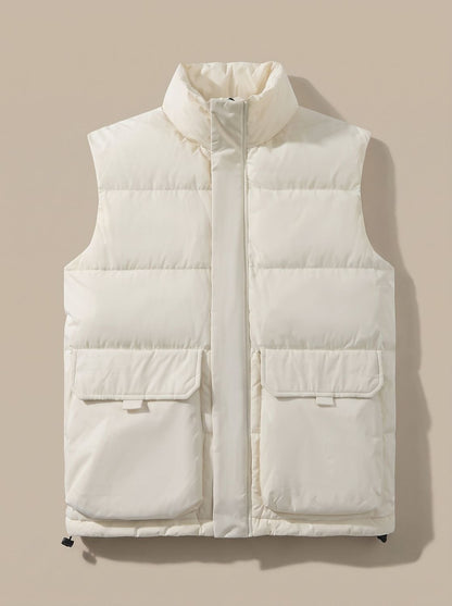 Women's quilted puffer vest with stand collar, flap pockets, and hidden zipper by Homixa, showcasing a cozy, stylish outerwear piece.