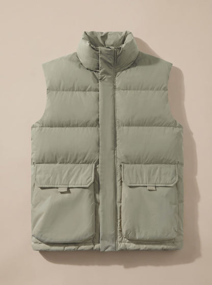 Women's Homixa quilted stand-collar puffer vest with flap pockets and hidden zip, stylish and warm outerwear.