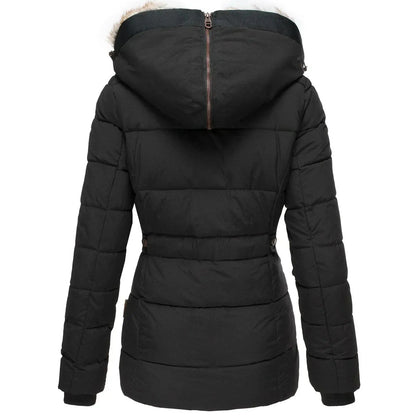 Women's quilted winter jacket by Homixa with a fur-lined hood and zippered pockets, shown on a model outdoors in cold weather.