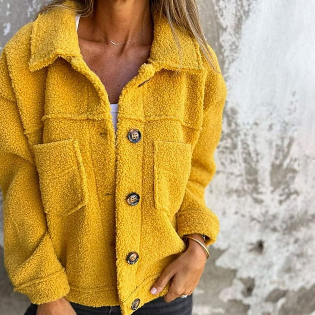 Women's relaxed-fit Teddy fleece jacket by Homixa with button front and chest pockets, cozy and casual outerwear.