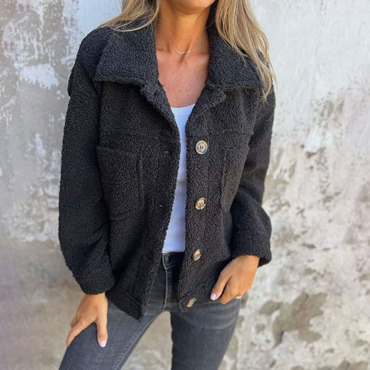 Women's relaxed-fit Teddy fleece jacket by Homixa with button-front closure and chest pockets, styled for casual comfort.