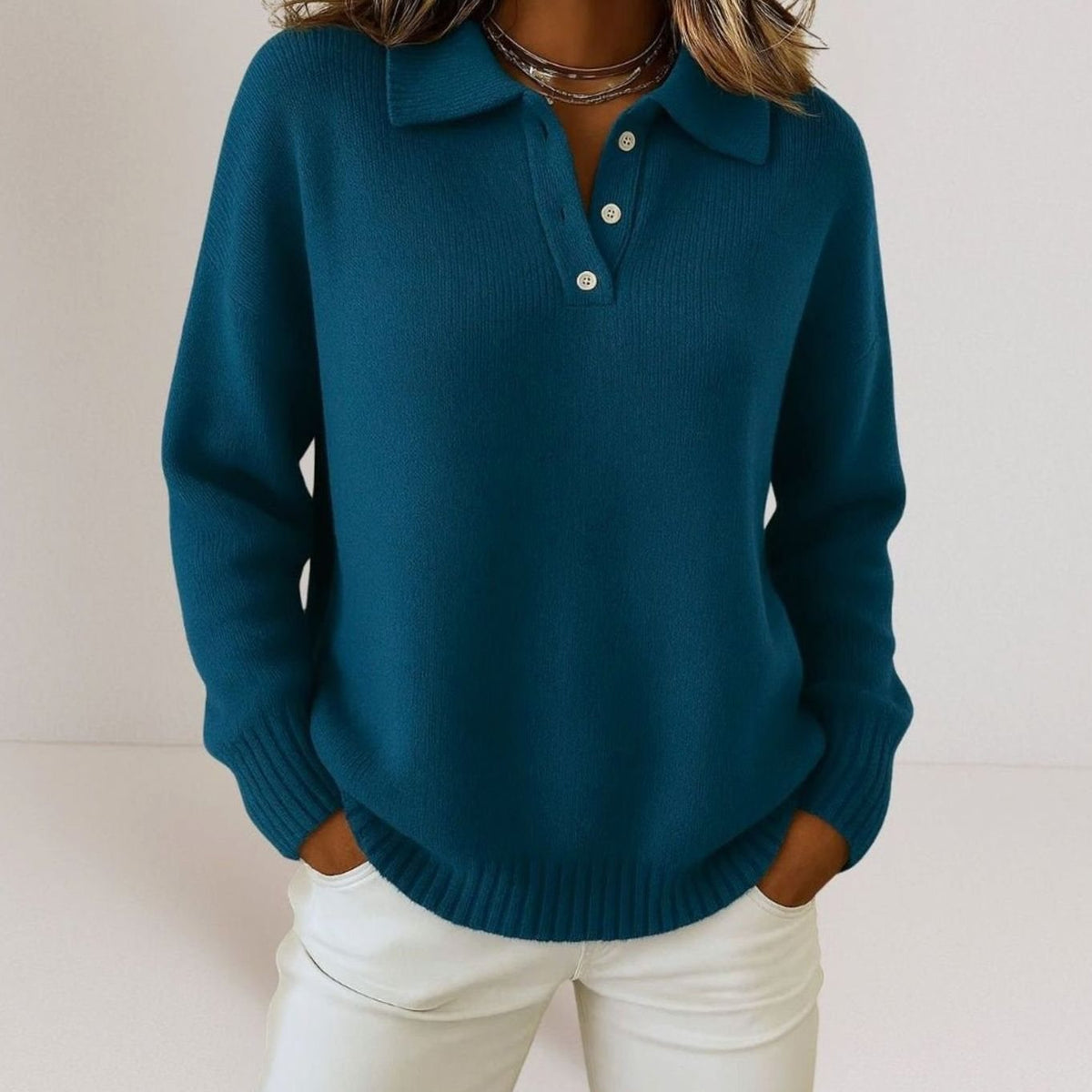 Women's relaxed-fit fine-knit sweater with polo collar and three-button placket, by Homixa, shown on a model.