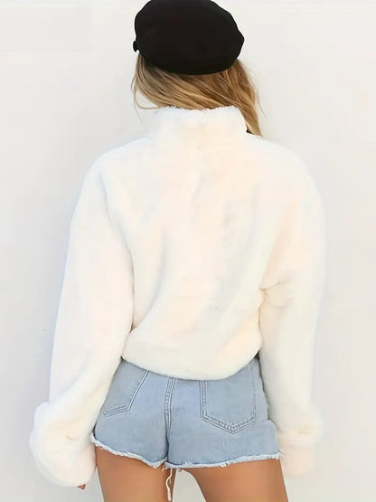 Women's fluffy sweater with high collar and voluminous sleeves, relaxed fit, by Homixa, shown in soft, cozy fabric.