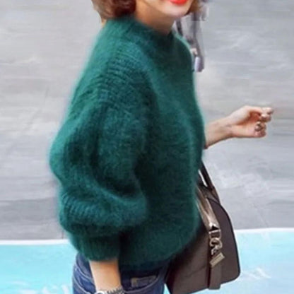 Women's relaxed-fit fuzzy rib-knit turtleneck sweater with wide sleeves by Homixa, showcasing soft, fluffy knit fabric and wide sleeve design.