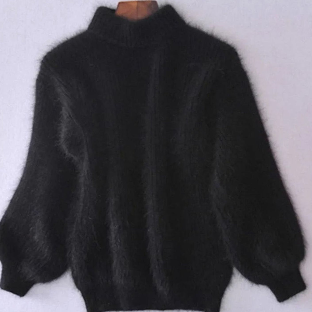 Women’s relaxed-fit fuzzy rib-knit turtleneck sweater with wide sleeves, by Homixa, featuring a cozy, fluffy knit texture.
