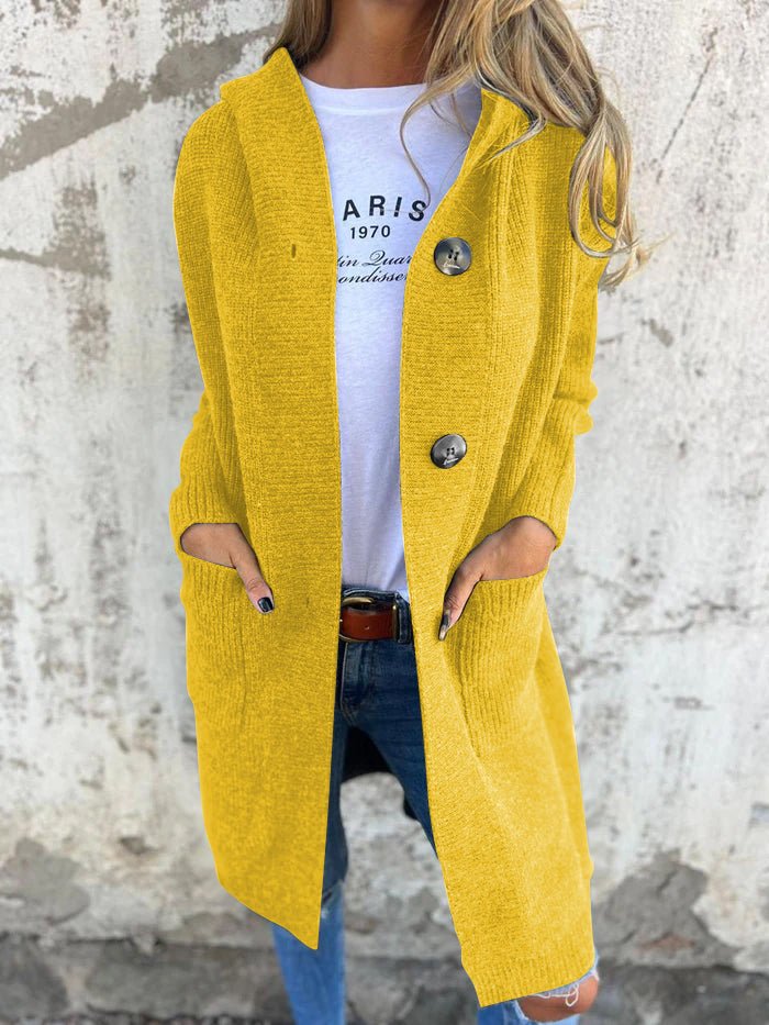 Women's relaxed-fit hooded longline cardigan by Homixa with button front and patch pockets, displayed on a model.