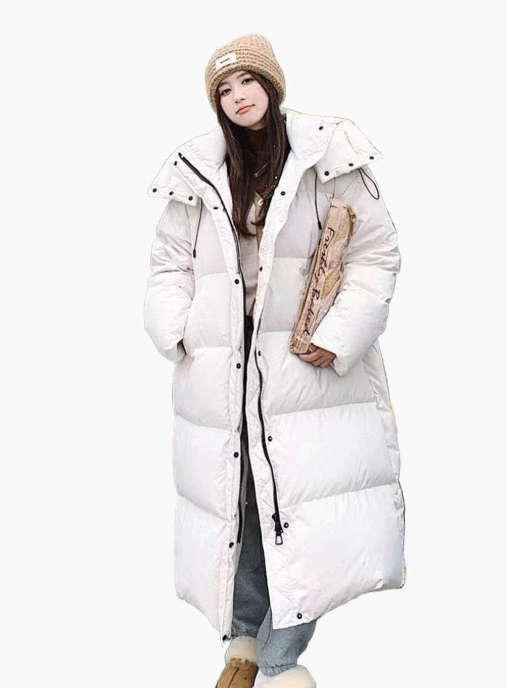 Women's relaxed-fit long puffer coat by Homixa with side pockets and a quilted hood, suitable for cold weather.