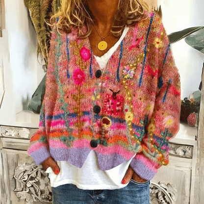 Women's relaxed-fit floral V-neck cardigan by Homixa with long sleeves and button front, displayed on a model.