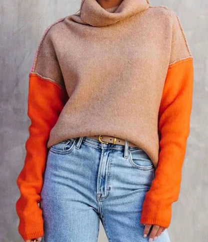 Women’s relaxed-fit long-sleeve turtleneck sweater with bold color-block panels, by Homixa, showcasing a stylish casual look.