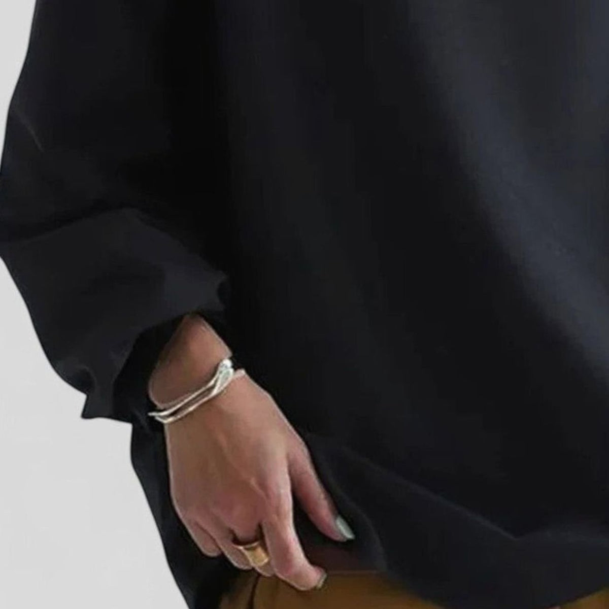 Women’s relaxed-fit mock-neck long-sleeve sweatshirt with a draped silhouette, by Homixa, shown in a comfortable, stylish fit.