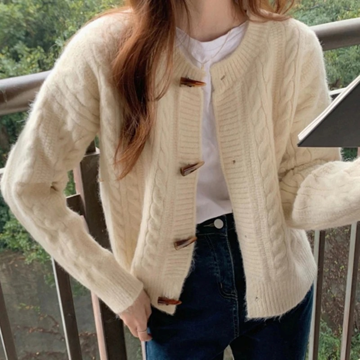 Women's retro ribbed-knit sweater by Homixa featuring toggle buttons and a relaxed fit, shown front view.