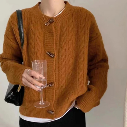 Women's retro ribbed-knit sweater by Homixa with toggle buttons and relaxed fit, featuring a cozy, vintage-inspired style.