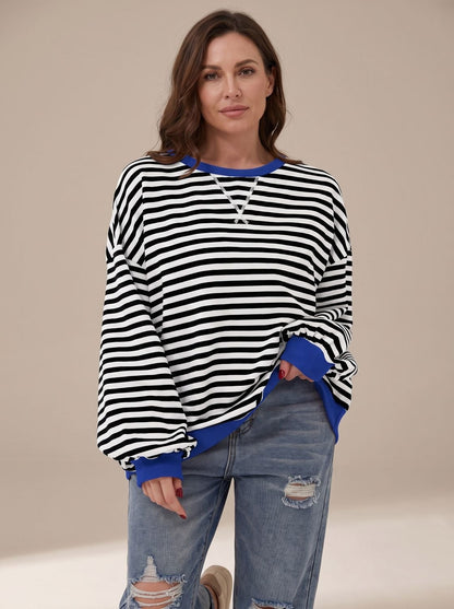 Women's retro striped oversized crew-neck sweatshirt by Homixa with contrast trim, featuring bold horizontal stripe pattern and relaxed fit.
