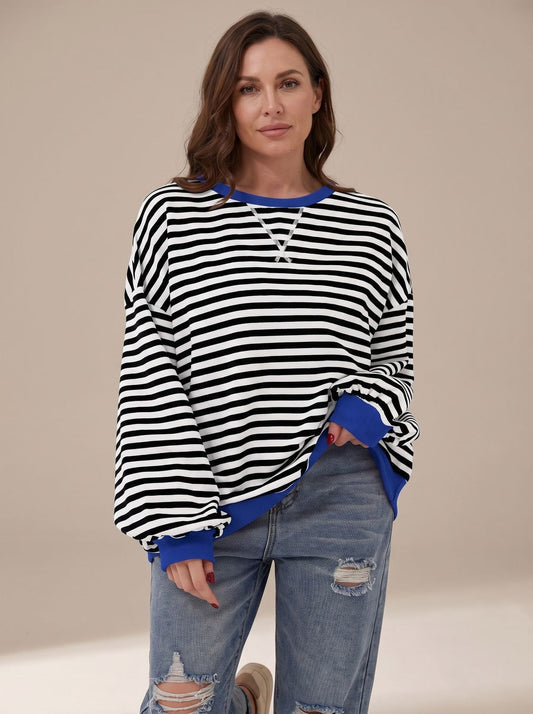 Women's retro striped oversized crew-neck sweatshirt by Homixa with contrast trim, featuring bold horizontal stripe pattern and relaxed fit.