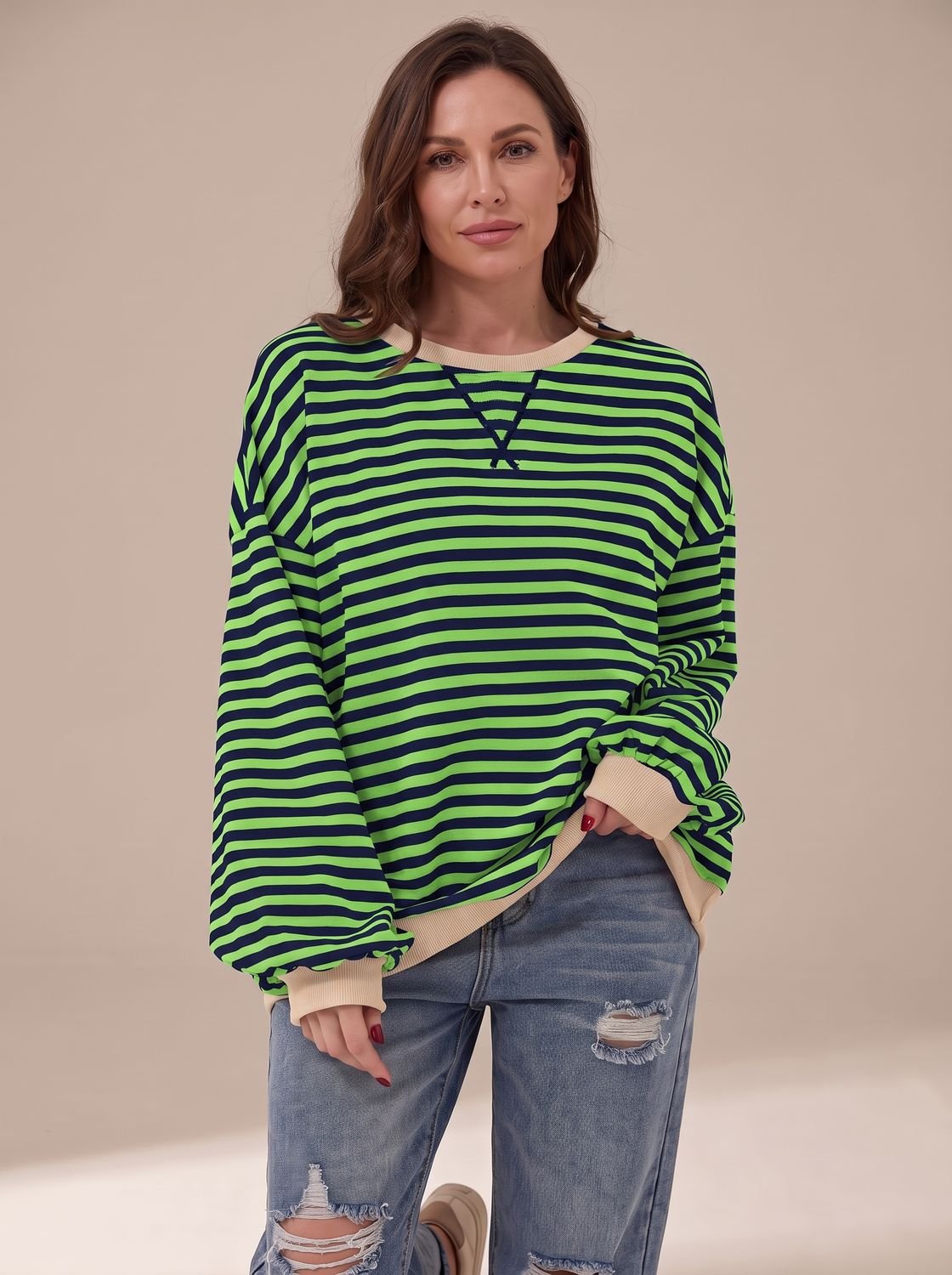 Women's oversized striped crew-neck sweatshirt by Homixa featuring retro design and contrast trim, shown in navy and white with relaxed fit.