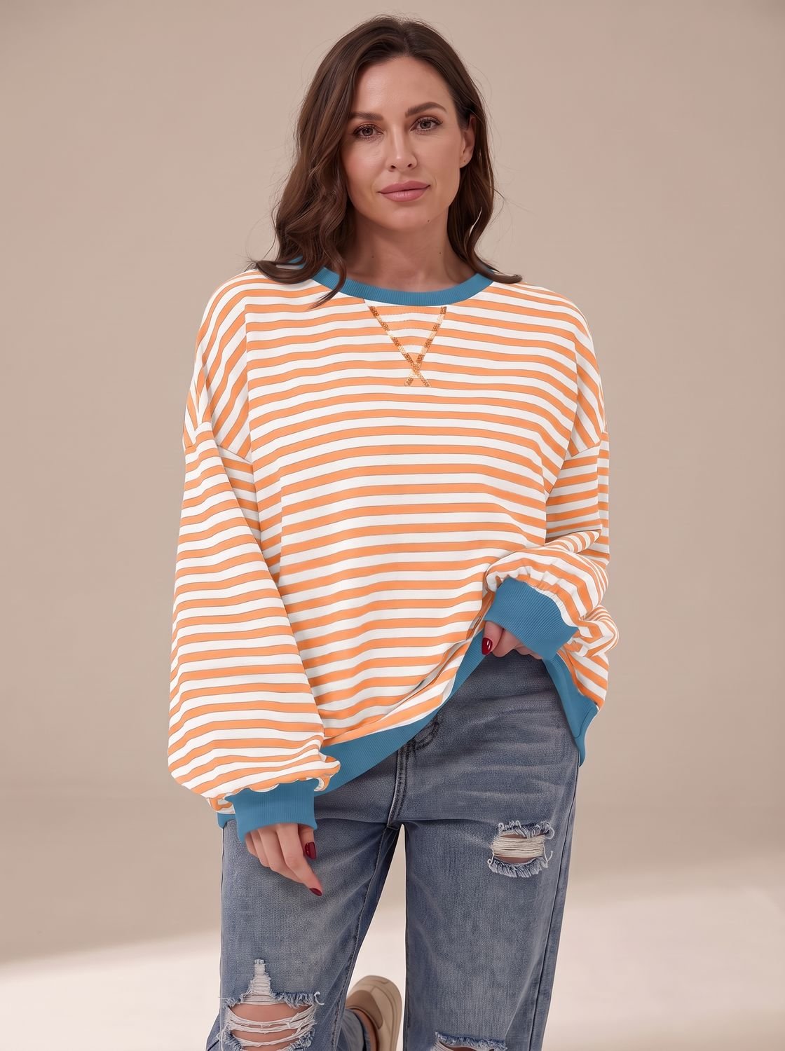 Women's oversized striped sweatshirt by Homixa with contrast trim, featuring a retro crew-neck design and relaxed fit.
