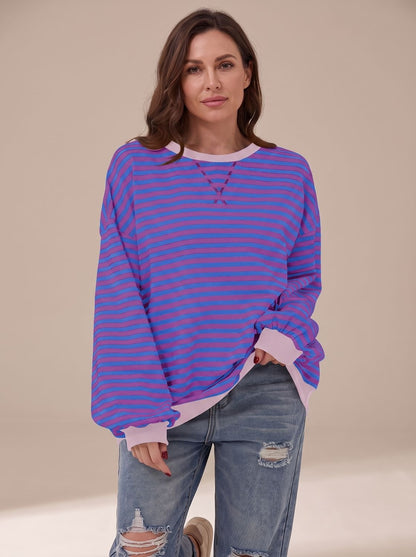 Women's retro striped oversized crew-neck sweatshirt by Homixa with contrast trim, featuring bold horizontal stripes and cozy fit.