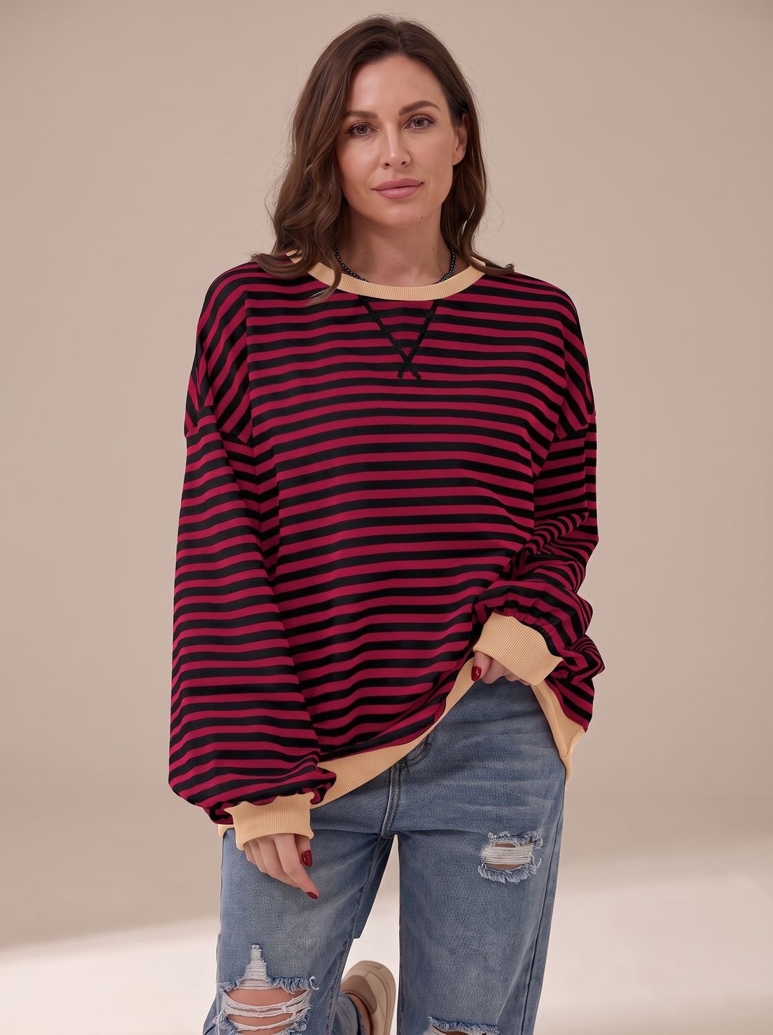 Women's oversized striped crew-neck sweatshirt with contrast trim by Homixa, featuring a retro design and relaxed fit.