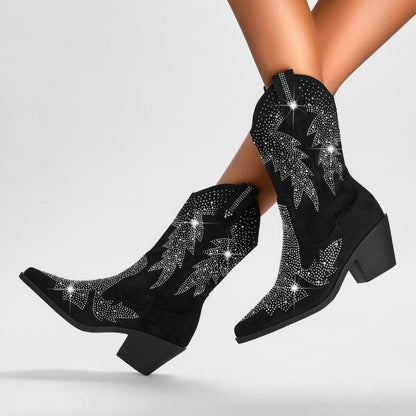 Women's rhinestone cowboy boots with star motif and sturdy block heel, featuring sparkling rhinestone details and western style.