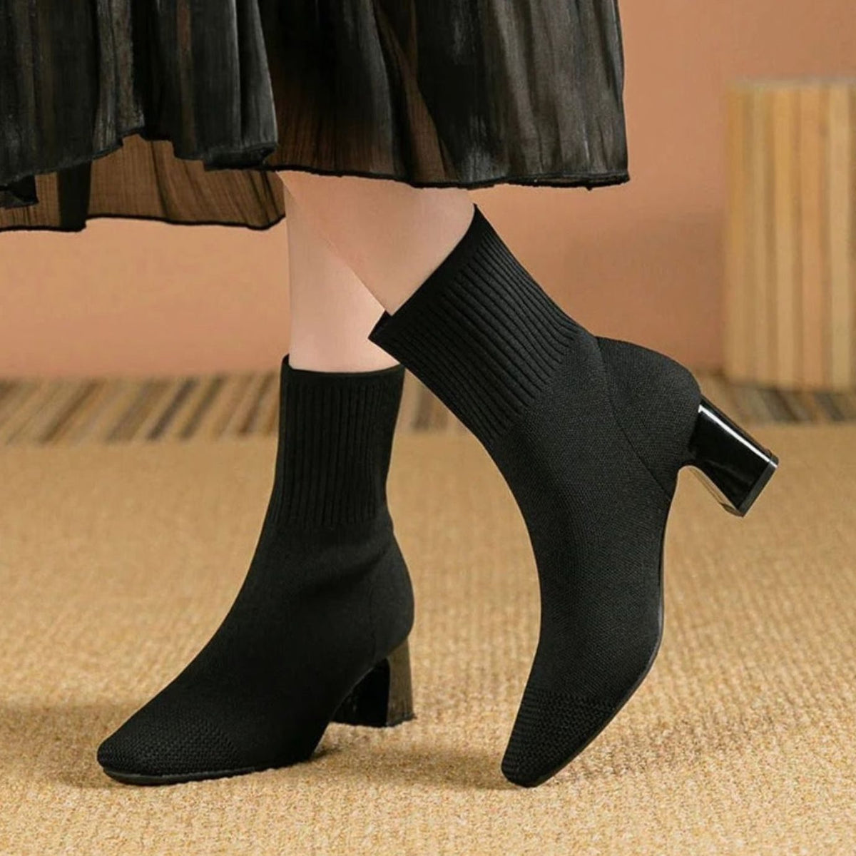 Women's ribbed-knit sock booties with block heel and stretch pull-on shaft from Homixa, showcasing the stylish design and textured knit.