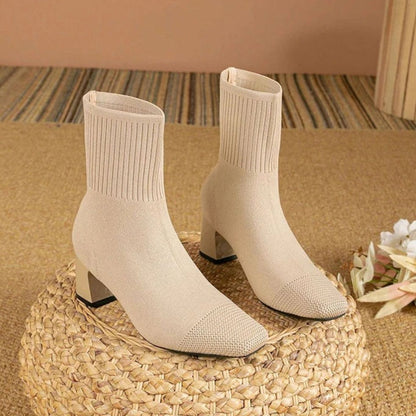 Women's ribbed-knit sock booties with block heel and stretch pull-on shaft by Homixa, showcasing sleek design and comfortable fit.