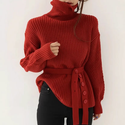 Women’s ribbed-knit turtleneck sweater by Homixa with long sleeves and wide waist belt, shown on a model.