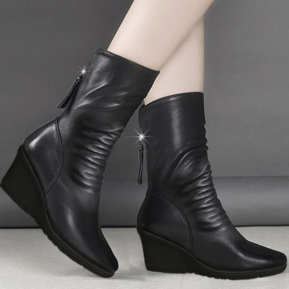 Homixa women's faux-leather wedge winter boots with side zipper and mid-calf shaft, featuring ruched design and sturdy wedge heel.