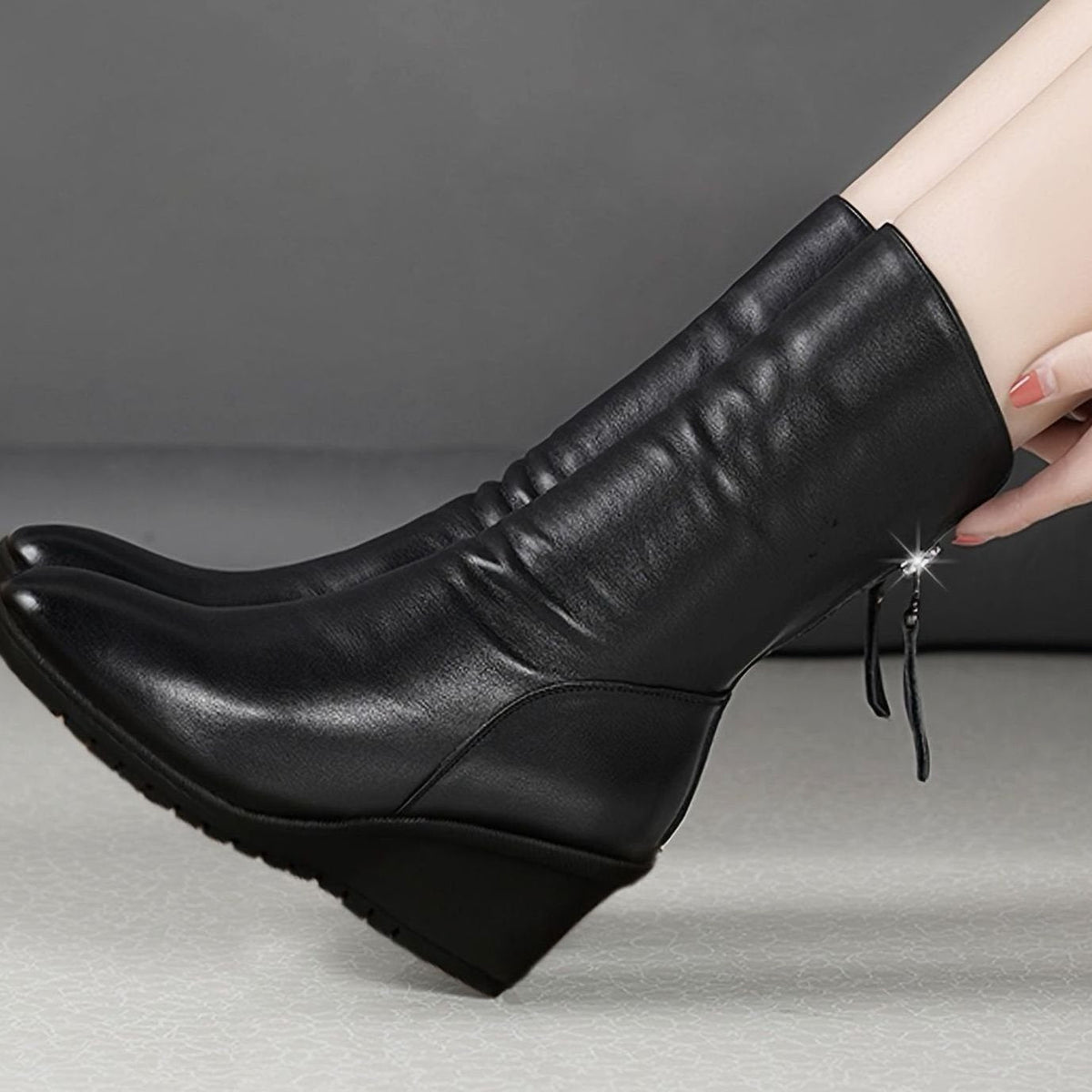 Women's faux-leather wedge winter boots with ruched design, side zipper, and mid-calf shaft by Homixa.