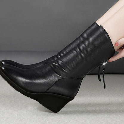 Women's faux-leather wedge winter boots with ruched design, side zipper, and mid-calf shaft by Homixa.