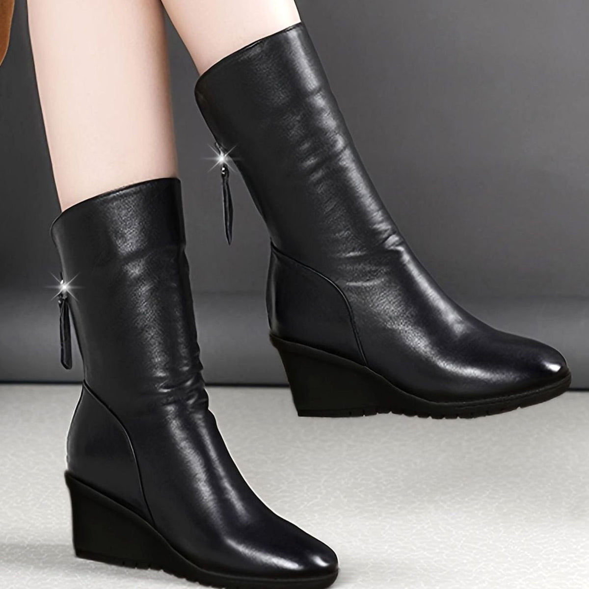 Women's faux-leather wedge winter boots by Homixa with ruched design, side zipper, and mid-calf shaft, suitable for cold weather.