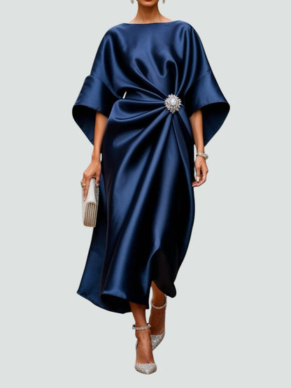 Elegant women's satin evening dress by Homixa featuring twisted design and gemstone embellishments, perfect for formal occasions.