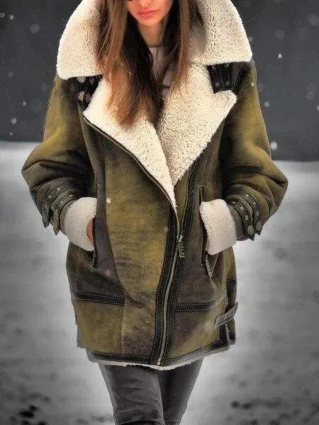 Women's Sherpa jacket by Homixa featuring an oversized plush collar, zip front, and turnback cuffs, shown on a model.