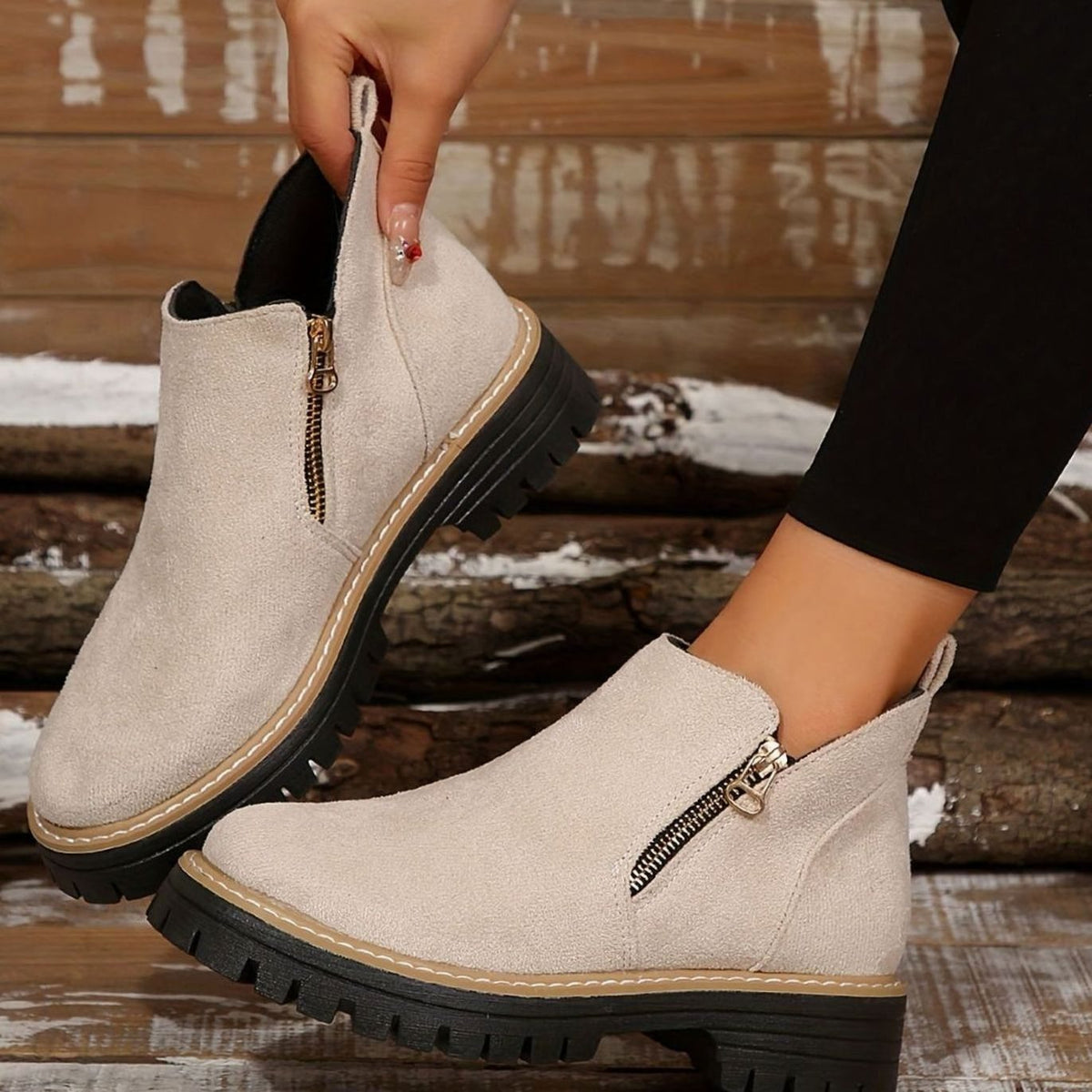 Homixa women's side-zip ankle boots with low block heel, cushioned insole, and treaded sole, shown from the side view.