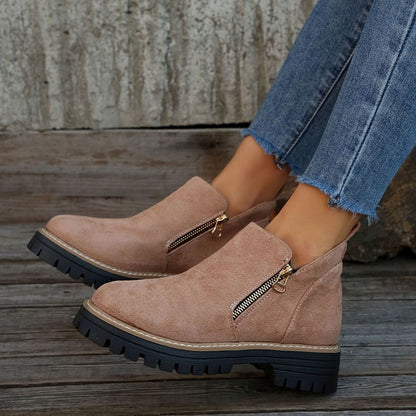 Homixa women's side-zip ankle boots with low block heel, cushioned insole, and treaded sole, showcasing their stylish design and comfort.