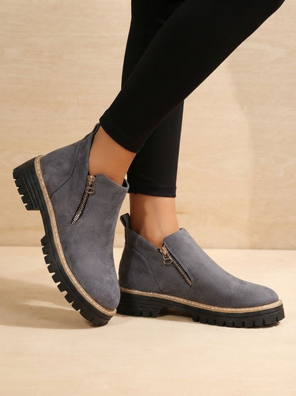 Homixa women's side-zip ankle boots with low block heel, cushioned insole, and treaded sole for comfort and style.